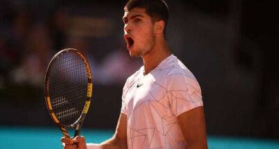 Rafael Nadal - Carlos Alcaraz - Carlos Alcaraz overcomes injury to beat Rafael Nadal and set up Novak Djokovic semi-final - msn.com - Madrid