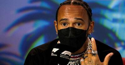 Motor racing-Hamilton gets two race exemption from jewellery rule