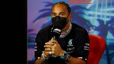 Lewis Hamilton - Sebastian Vettel - Formula One stars Hamilton, Vettel protest new rules against body piercings, jewellery - cbc.ca - Britain