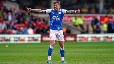 Relegated Peterborough sign off with thumping win over Blackpool