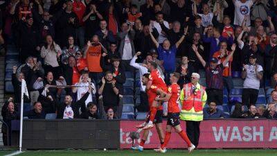 Clever Harry Cornick seals Luton’s place in play-offs after beating Reading