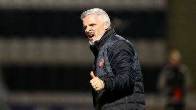 Jim Goodwin has an eye on the future after draw with Hibs