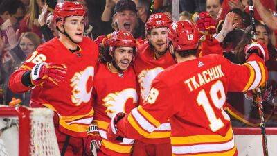 Matthew Tkachuk - Elias Lindholm - Darryl Sutter - Johnny Gaudreau - How the Calgary Flames' top line continues to ignite their offensive engine - espn.com