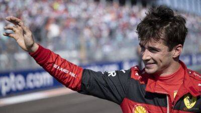 Motor Racing-Leclerc in pole but says tricky Miami track 'slippery'