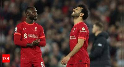 Liverpool's Premier League title bid hit by draw with Tottenham Hotspur, Manchester United thrashed at Brighton
