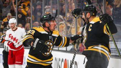 Bruins beat Canes in Game 4 to pull even in series