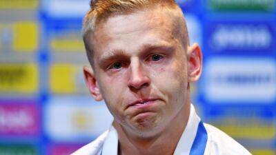 Tearful Oleksandr Zinchenko wants to give Ukraine ‘incredible emotions’ by reaching World Cup amid invasion from Russia