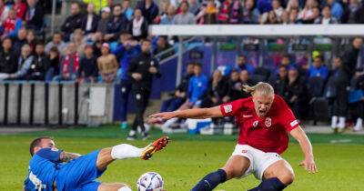 Soccer-Norway held to home stalemate by 10-man Slovenia