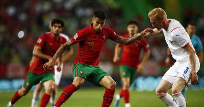 Soccer-Cancelo, Guedes strike as Portugal ease past Czech Republic