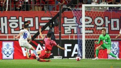 South Korea fight back to earn draw after Almiron double