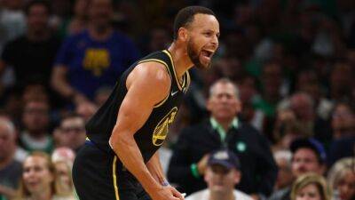 Curry leads Warriors' 4th-quarter surge to even NBA Finals series against Celtics