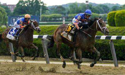 Mo Donegal surges from behind to cross finish line first in Belmont Stakes