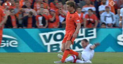 Manchester United target Frenkie de Jong reacts after hobbling away from awful challenge