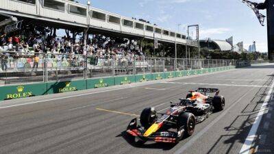 Verstappen rides luck to Red Bull one-two in Baku as Ferrari implode