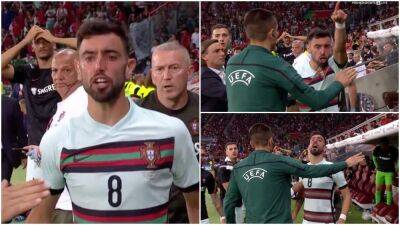 Fernando Santos - Bruno Fernandes - Bruno Fernandes loses his head and appears to swear at opponent in Switzerland 1-0 Portugal - givemesport.com - Manchester - Switzerland - Portugal -  Santos