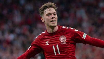 Denmark ease past Austria with goals from Jonas Wind and Andreas Olsen to stay top of Group A1
