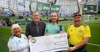 Former Celtic keeper Pat Bonner applauds Tartan Army as Scotland fans donate cash to children's charity in Ireland
