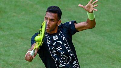 Auger-Aliassime rides powerful serve to 2nd round of Halle Open in Germany