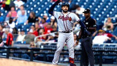Braves hit five homers, beat Nats for 13th straight win