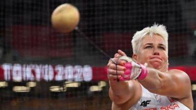 Olympic hammer champion Wlodarczyk out for season after injury chasing thief