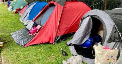 Hundreds of Harry Styles fans camp outside Emirates Old Trafford to be first in the queue...despite pleas not to
