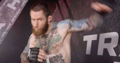 Russian MMA fighter forced to cover up Nazi tattoo before losing bout