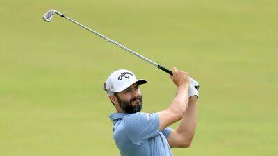 US Open Resumes With Adam Hadwin Ahead, Stormy Scene For Rory McIlroy