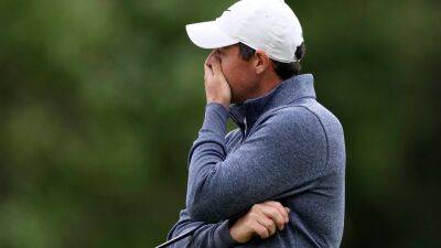 Rory McIlroy battles to remain in contention after breezy conditions at US Open