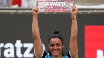 Jabeur wins Berlin Open, comforts injured Bencic