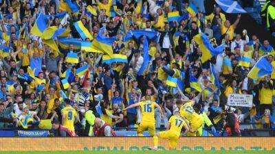 Ukraine claim emotional win as Scots dream ends