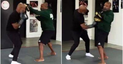 Mike Tyson - Henry Cejudo - Mike Tyson, 55, proves he's still got it as he teaches Henry Cejudo the Peakaboo boxing style - givemesport.com