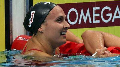 Masse's bid for 3rd straight world 100m backstroke title spoiled by Regan Smith