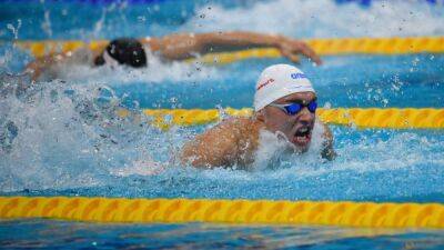 Hungary's Milak smashes world record in 200m butterfly