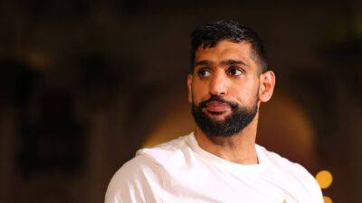 Three arrested after Amir Khan robbed of watch at gunpoint