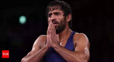 SAI approves star wrestler Bajrang Punia's US training, TOPS cyclists to get faster T20 bikes - timesofindia.indiatimes.com - France - Germany - Usa -  Tokyo - Birmingham - state Michigan