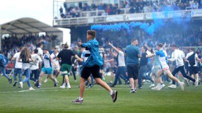 FA charges Bristol Rovers after pitch invasion during win over Scunthorpe