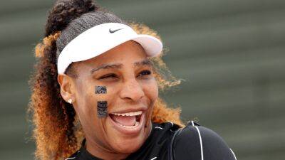 Serena Williams, Iga Swiatek and Emma Raducanu train at Wimbledon - in pictures