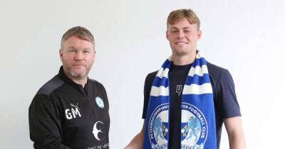 Harvey Cartwright in battle with Chelsea teenager for Peterborough goalkeeping gloves