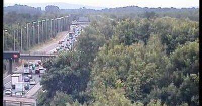 M6 delays as car on fire while caravan overturns on nearby slip road - manchestereveningnews.co.uk - Manchester