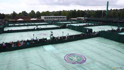 Wimbledon open for business, not quite as usual