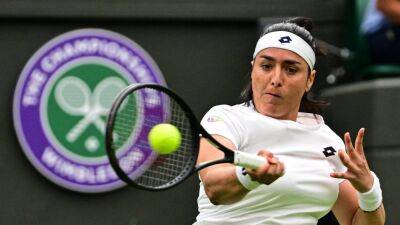 Ons Jabeur celebrates new world ranking high with easy win in first round of Wimbledon