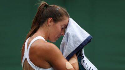 Lesia Tsurenko - Britain's Burrage plays Wimbledon Good Samaritan before early exit - channelnewsasia.com - Britain - Ukraine - London