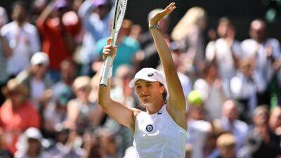 Iga Swiatek recovers from second-set stumble to seal first-round victory at Wimbledon