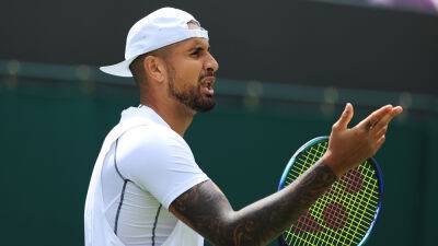 Nick Kyrgios - Paul Jubb - Wimbledon 2022: Nick Kyrgios spits in direction of heckling fan, lashes out at 'snitch' line judge - foxnews.com - Britain - Australia - London