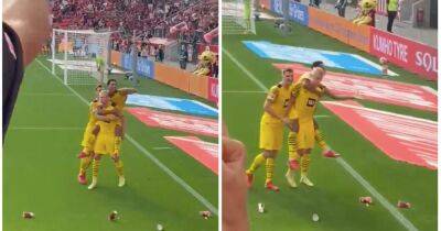Jude Bellingham's epic beer catch after Erling Haaland's penalty for Dortmund