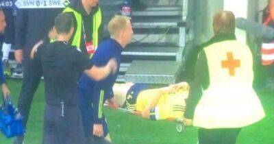 Carl Starfelt in Celtic injury sweat as Sweden boss offers 'problematic' update after defender is stretchered off