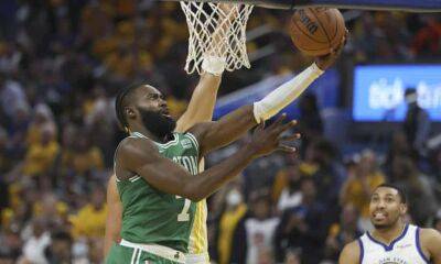Celtics use huge fourth quarter to roar past Warriors in NBA finals opener