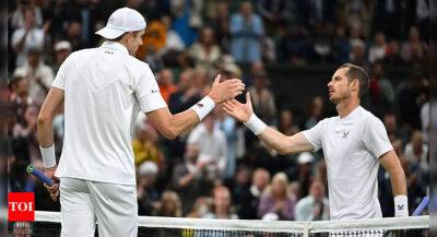 Wimbledon: John Isner sends Andy Murray crashing out in four sets