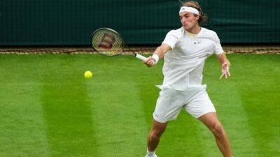 Stefanos Tsitsipas marches on with little fuss at Wimbledon