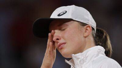 French Open champion Swiatek is 'overwhelmed' by Lewandowski support